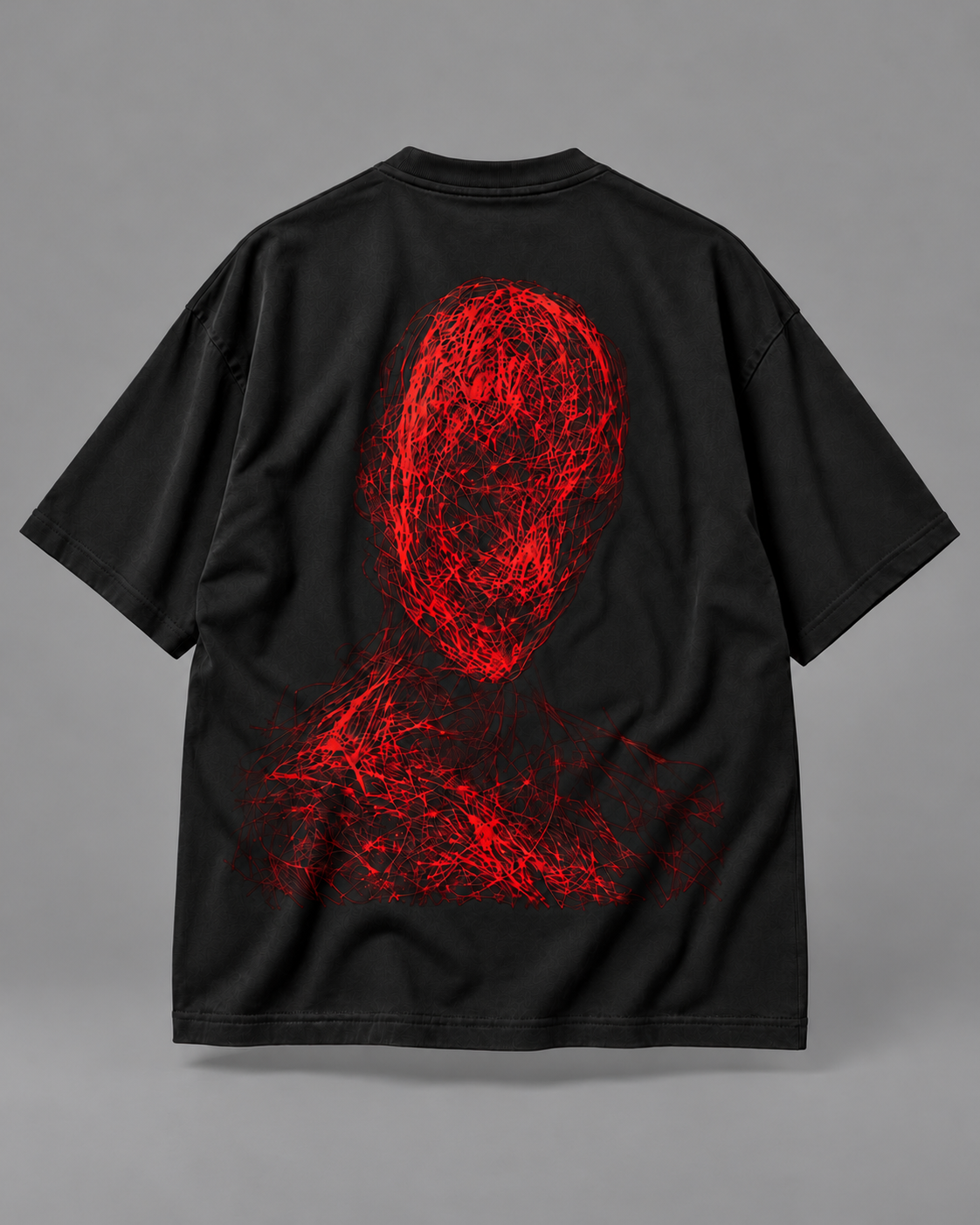 Abstract Face Oversized T-Shirt–Black — tonal studio backdrop