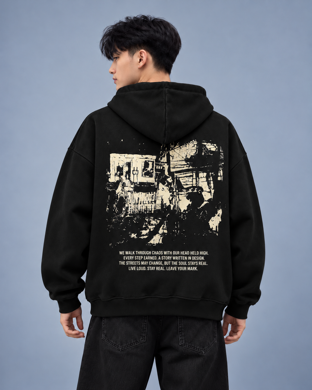 Street Soul black hoodie — model back on light slate-grey studio background