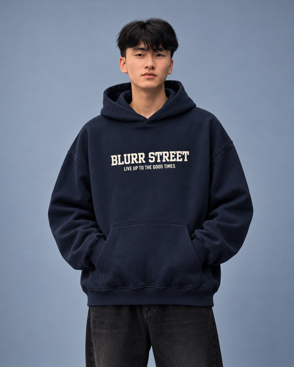 Street Soul navy hoodie — model front on blue-grey studio background